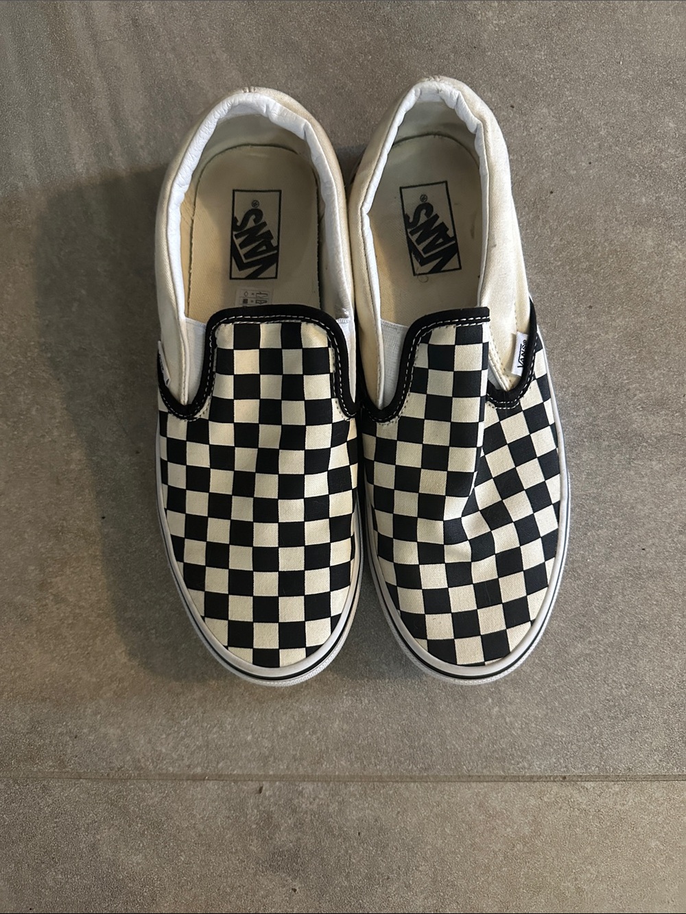 Vans woman’s Slip-On Checkerboard Sneakers - Black & White